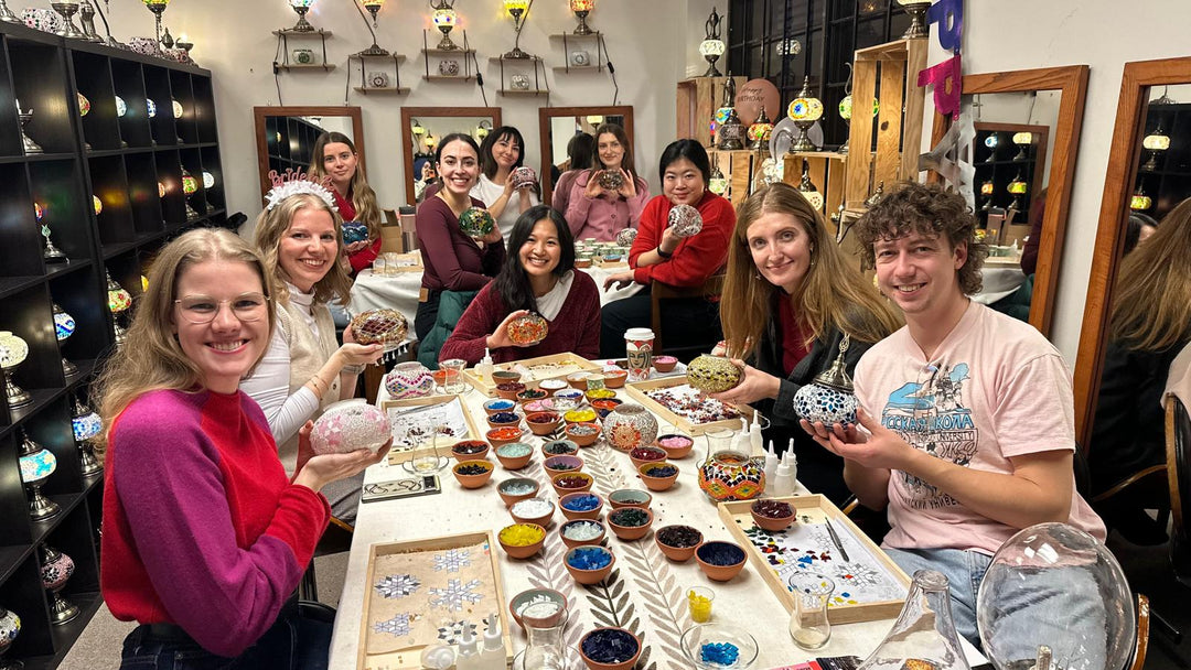  Participants creating Turkish mosaic lamps at a DIYLabs workshop in Toronto.
