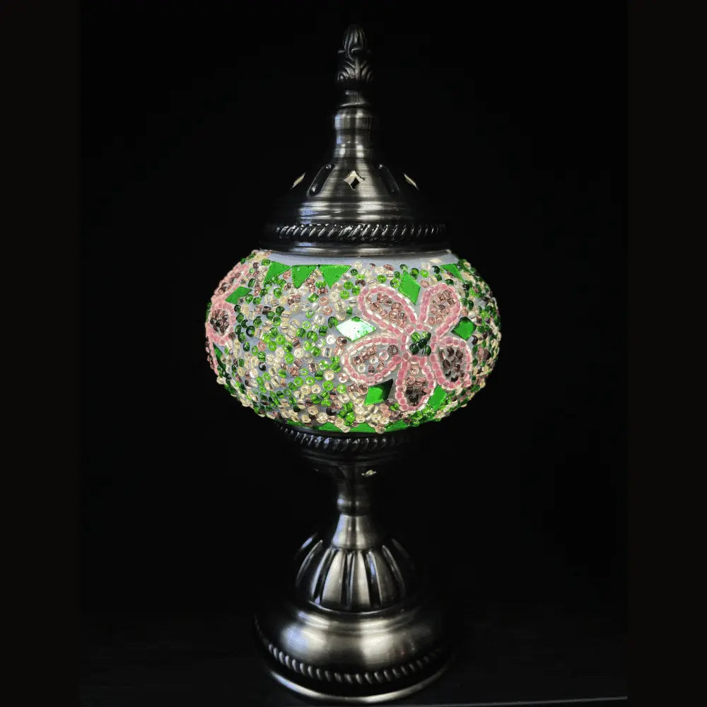 Pink handmade mosaic table lamp with stained glass tesserae and warm glow